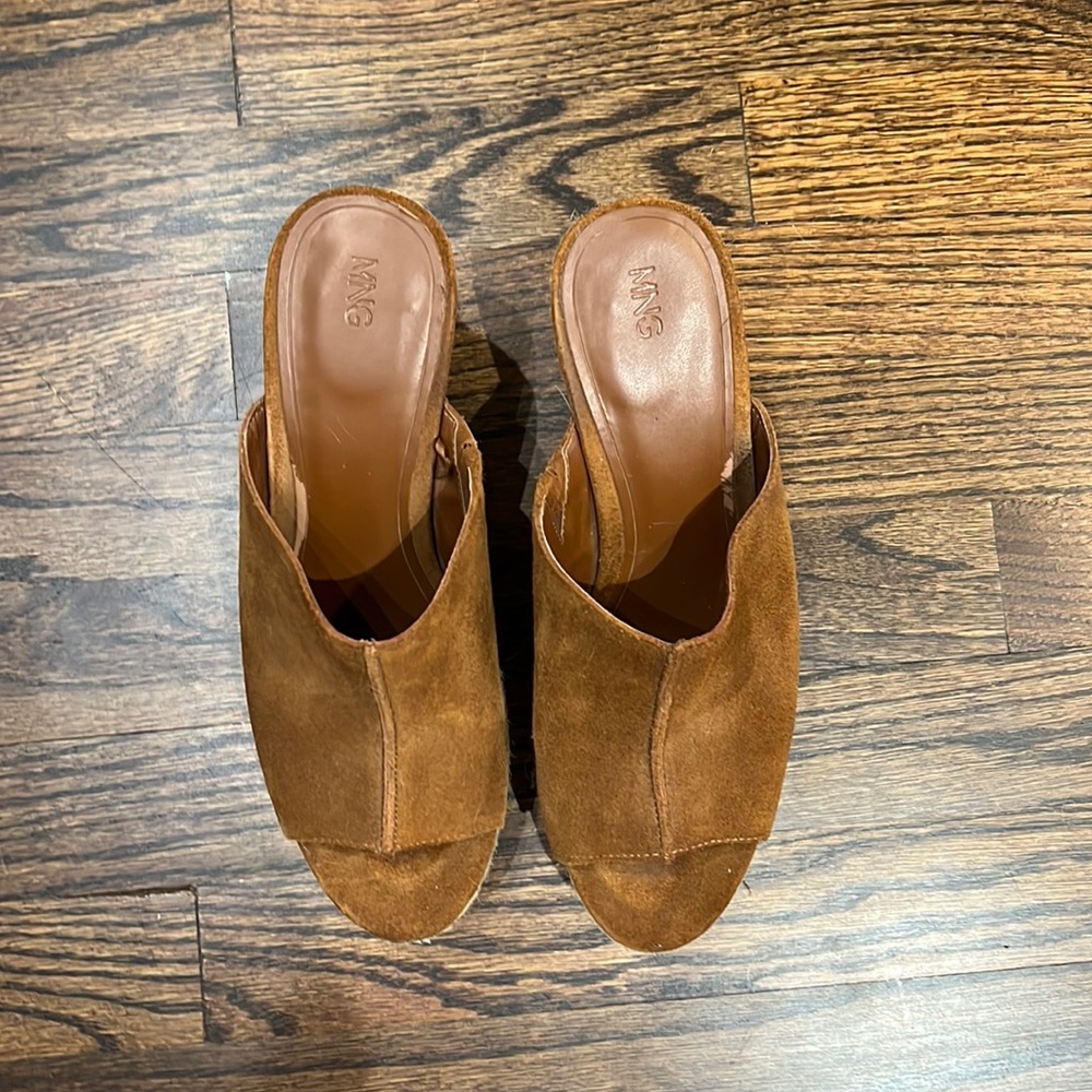 Brown suede mule.